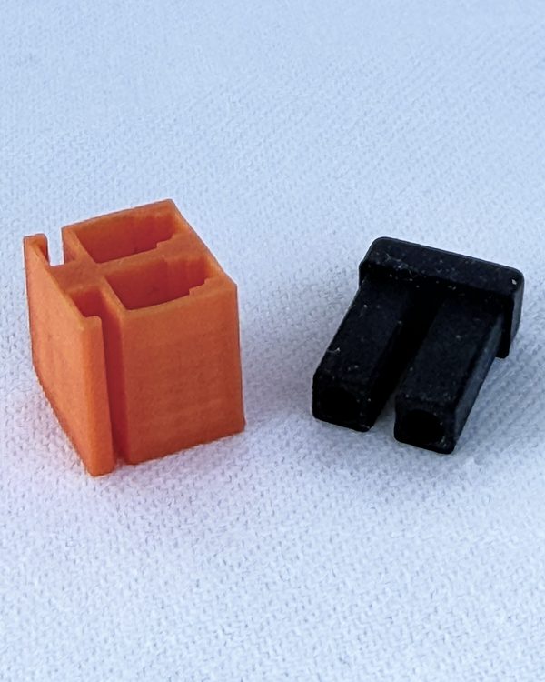 DuCSec LC next to the dust cap of an SFP module
